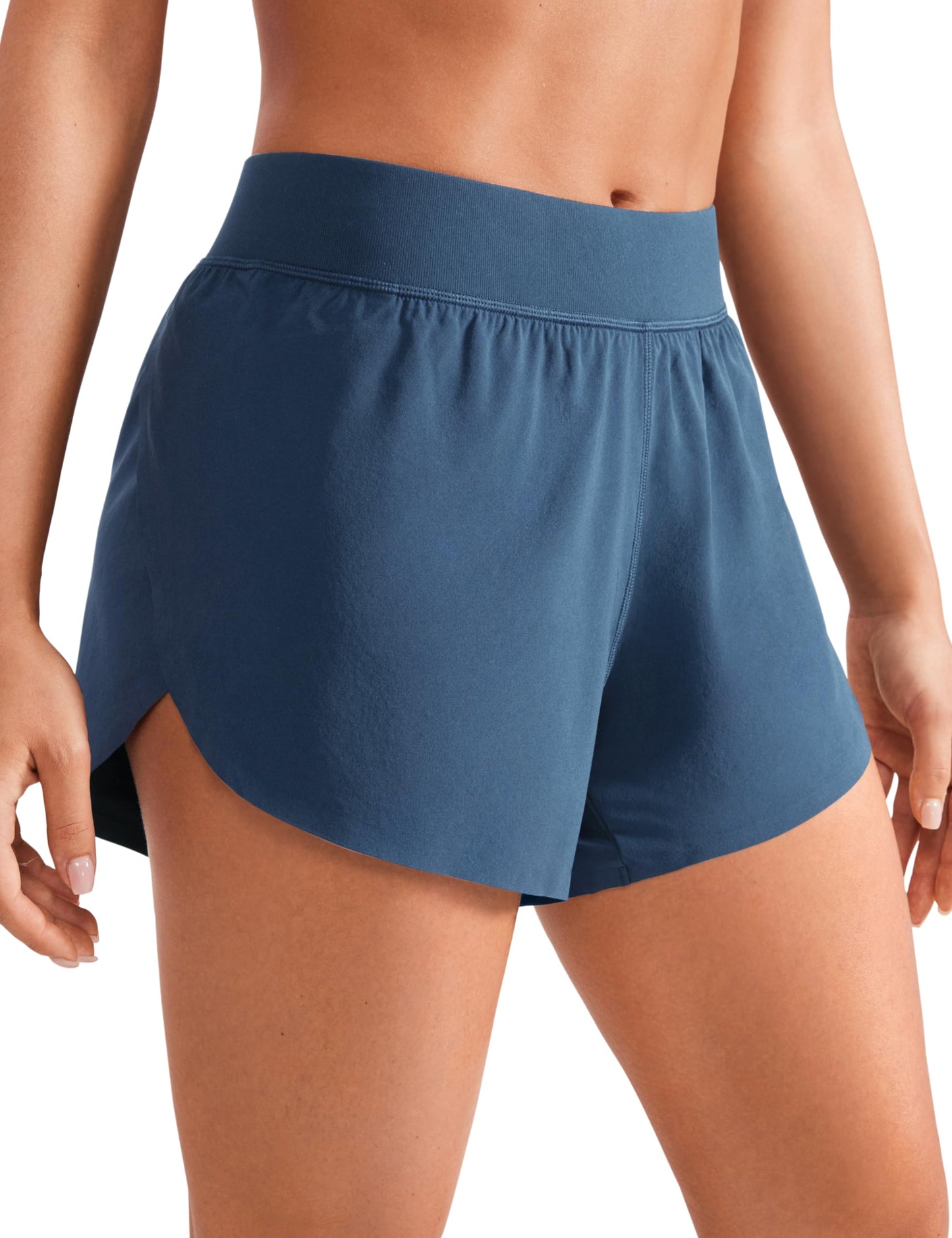 CRZ YOGA Mid Waisted Dolphin Athletic Shorts for Women Lightweight High Split Gym Workout Shorts with Liner Quick Dry Stelindigo XX-Small